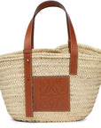 Loewe Medium Basket Bag - Front View: A stylish basket bag with woven detailing and leather accents.