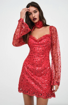 For Love & Lemons Gwendolyn Mini Dress in red sequin lace, size small. Features long sleeves, new with tags, and in beautiful condition. Ideal for parties with its head-turning sequin and beading details for a powerful look.