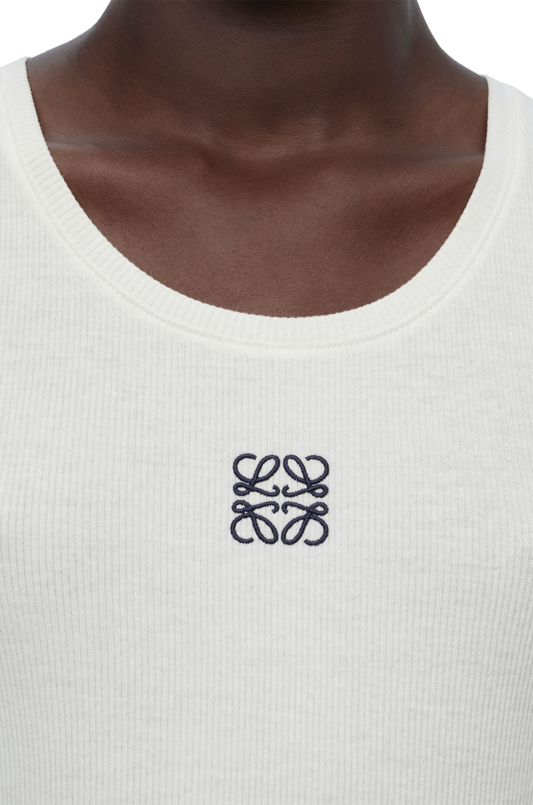 Something Borrowed. White ribbed tank top with LOEWE logo embroidery.