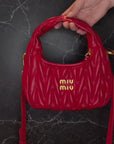 Rent for your upcoming holiday! Image of Miu Miu Wander Matelassé Nappa Leather Hobo Bag.